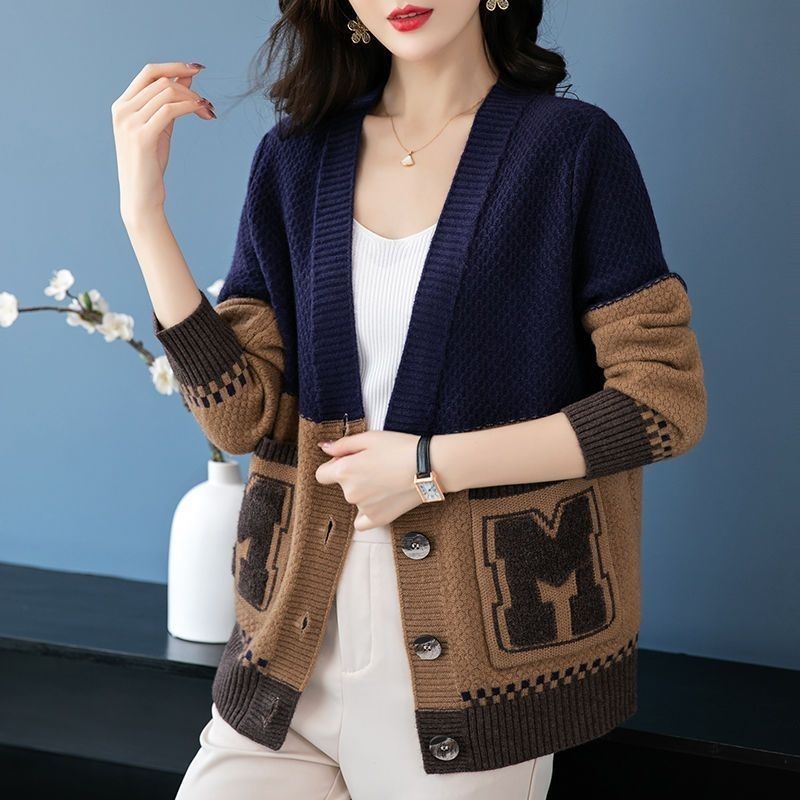 Damen Strickjacke mit Zopfmuster und Taschen Norvielle