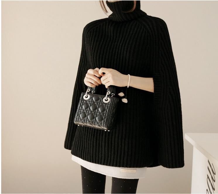 Damen Strickponcho mit hohem Kragen und Schlitzen Norvielle