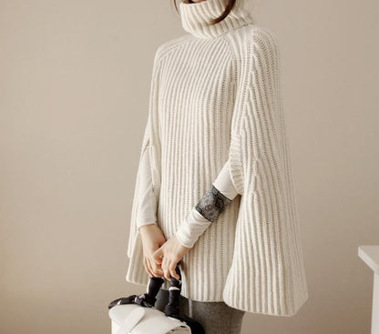 Damen Strickponcho mit hohem Kragen und Schlitzen Norvielle