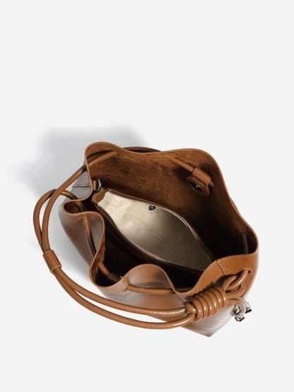 Glänzende Damenhandtasche mit Kordelzug
