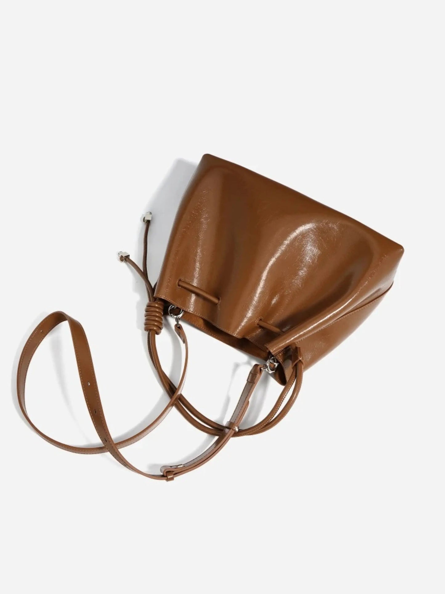 Glänzende Damenhandtasche mit Kordelzug