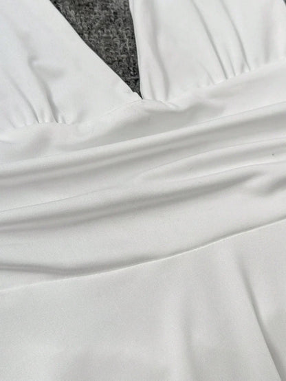 Damen Minikleid Halterneck Schwingrock Figurbetont