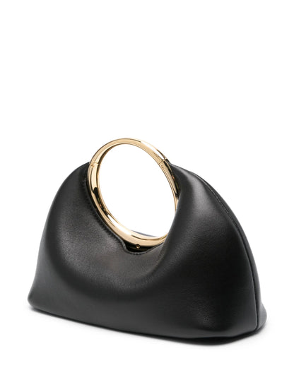 ivorene ringtasche frontansicht mit gewölbter form und goldring