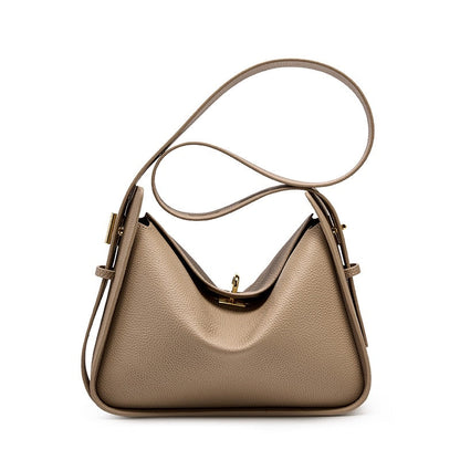 Elegante Damen Lederhandtasche Drehverschluss Gold Details