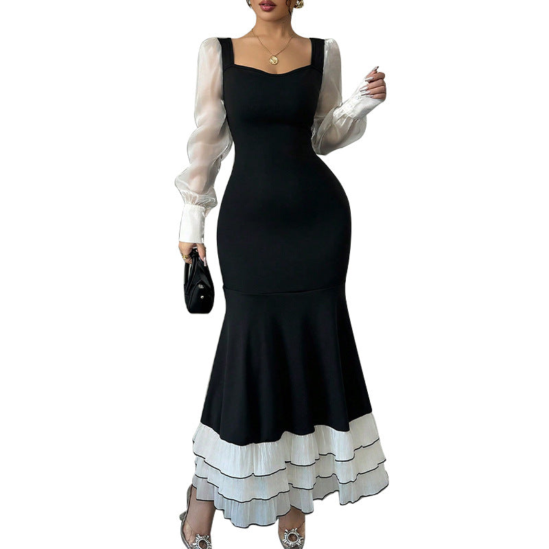 Damen Maxikleid transparente Puffärmel Rüschensaum Norvielle
