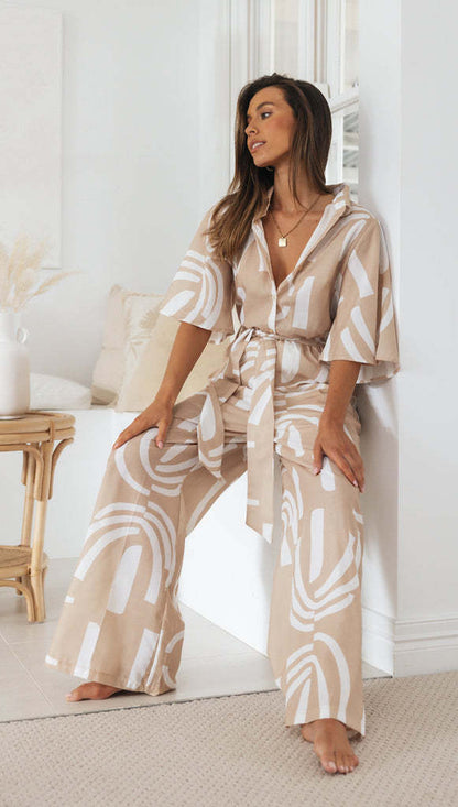 Damen Jumpsuit mit Bindegürtel und Muster
