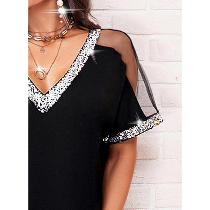 Damen Kleid mit transparenten Ärmeln und Glitzerverzierung