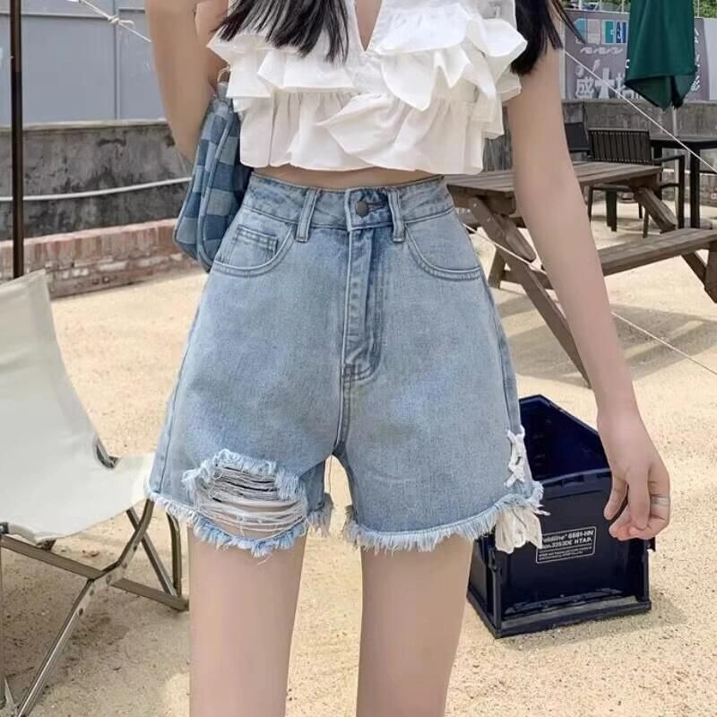 Damen Jeansshorts Destroyed Effekt Dunkelblau