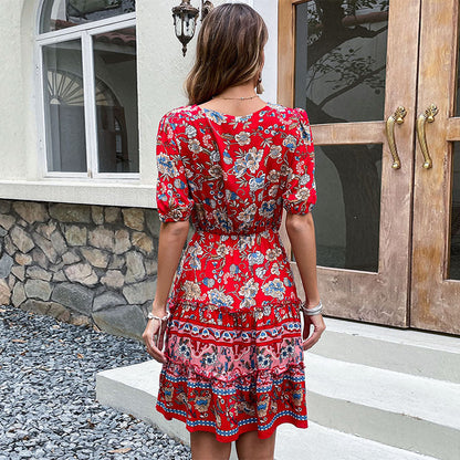 Damen Minikleid Asymmetrischer Saum Puffärmel Floral Norvielle