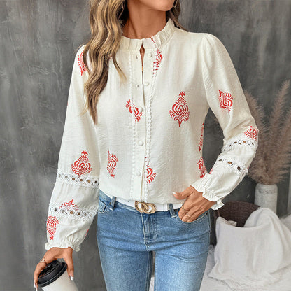 Damenbluse mit Stickerei und Rüschendetails
