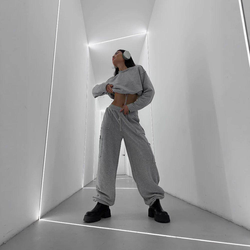 Damen Cropped Sweatshirt mit Kordelzug und weiten Ärmeln Grau