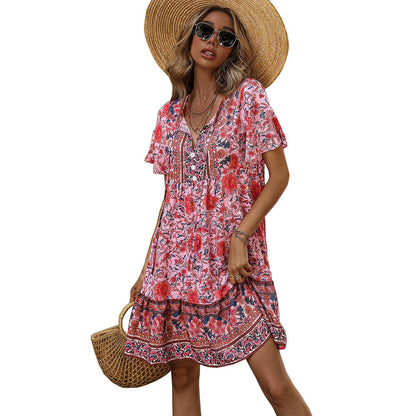Damen Blumenkleid Sommer Rüschensaum Knöpfe Norvielle