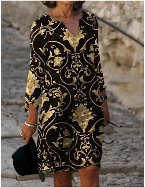 Damen Kleid mit floralem Muster V-Ausschnitt