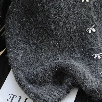 Damen Strickweste mit Glitzerakzenten und Dekorknöpfen