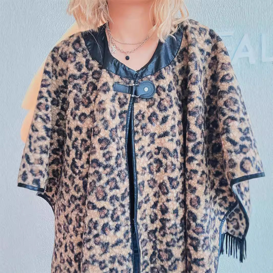 Damen Poncho mit Fransen Tierprint Norvielle