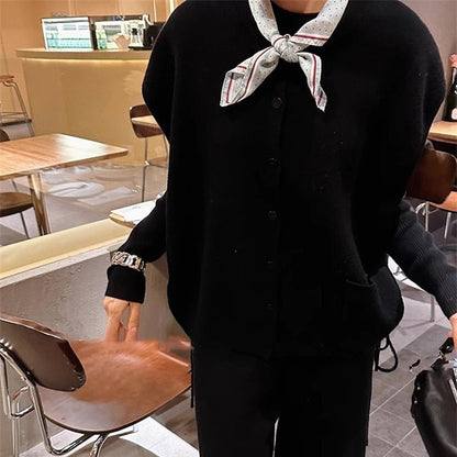 Damen Grobstrickjacke Norvielle mit Seitentaschen und Knopfverschluss