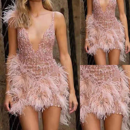 Damen Partykleid Paillettenbesatz Federdetails