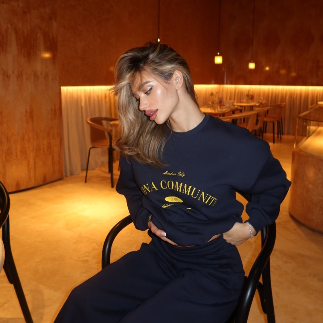 Damen Oversized Sweatshirt mit Schriftzuggestaltung und Jogginghose