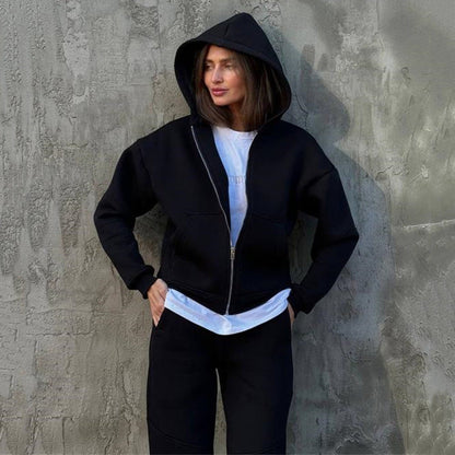 Damen Fleece-Jumpsuit mit Kapuze und Reißverschluss