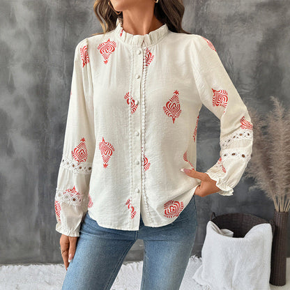 Damenbluse mit Stickerei und Rüschendetails
