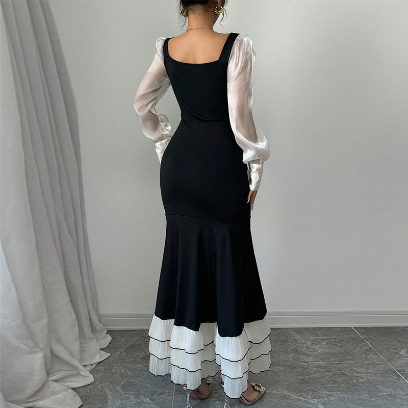 Damen Maxikleid transparente Puffärmel Rüschensaum Norvielle