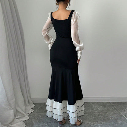 Damen Maxikleid transparente Puffärmel Rüschensaum Norvielle