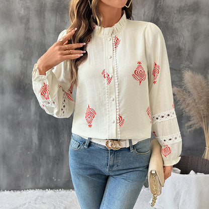 Damenbluse mit Stickerei und Rüschendetails