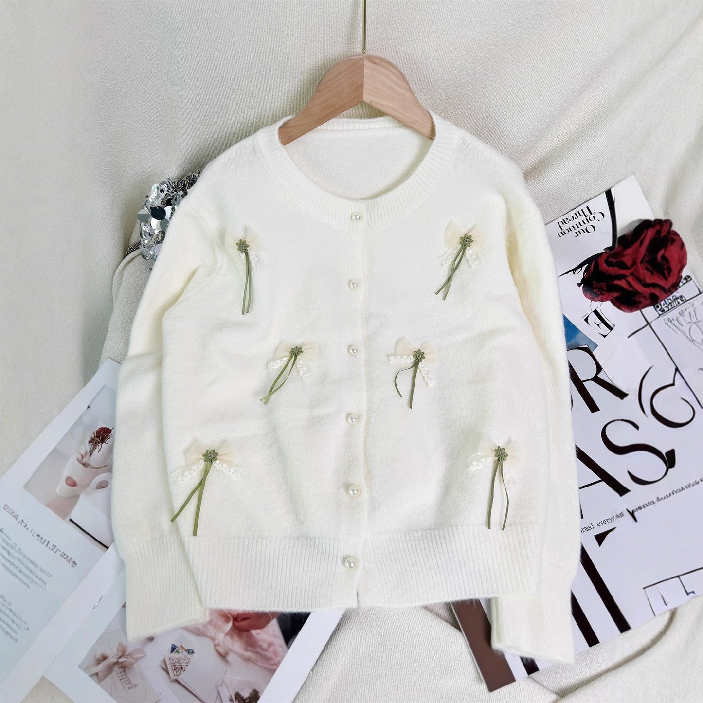 Damen Strickjacke mit Schleifen-Applikationen
