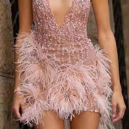 Damen Partykleid Paillettenbesatz Federdetails
