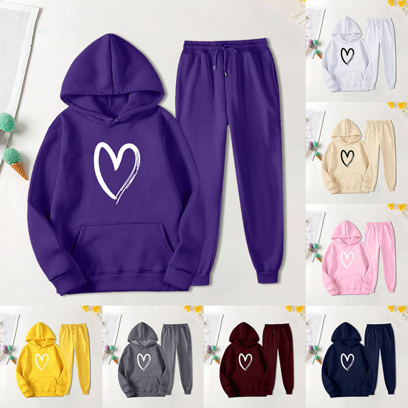 Damen Sweatanzug Kängurutasche Herzprint Grün