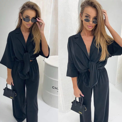 Damen Jumpsuit Bindegürtel Weite Beine Norvielle