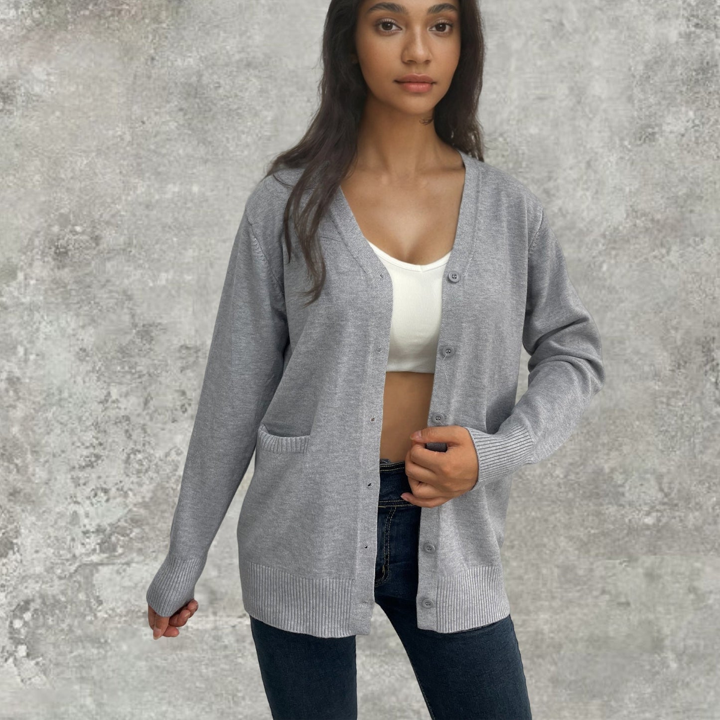 Damen Strickjacke Rippenmuster Taschen Beige