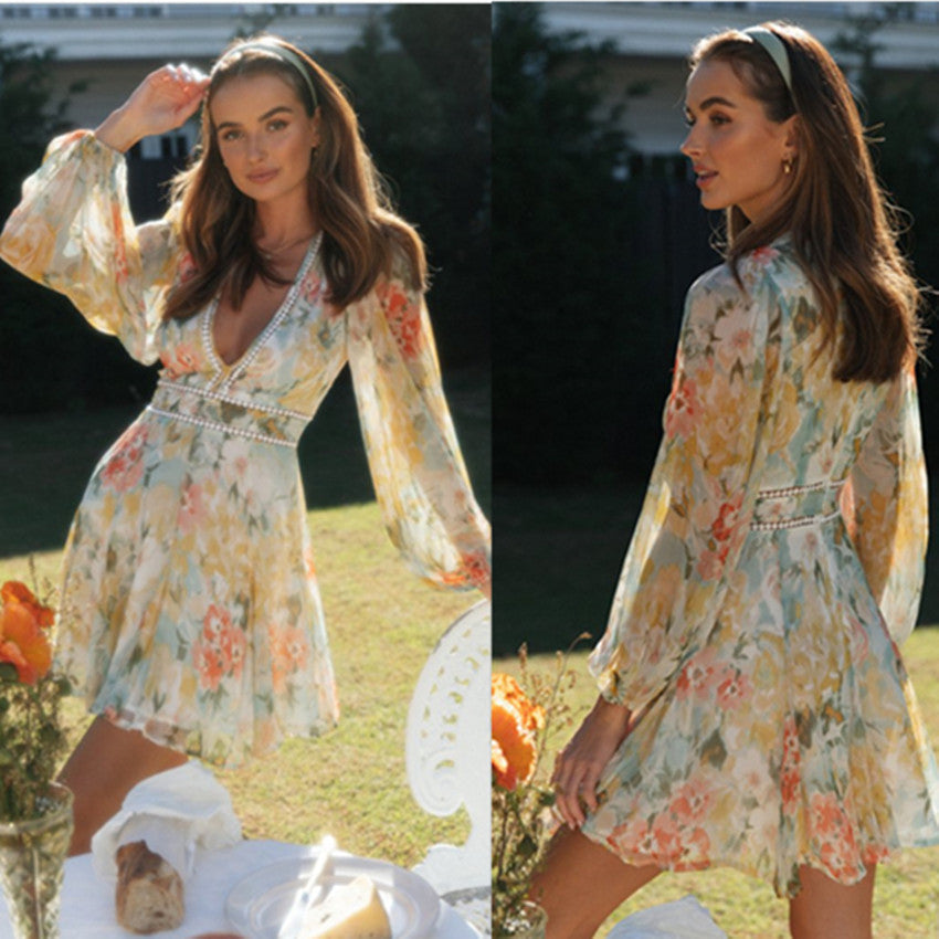 Damen Chiffonkleid mit Blumenmuster und V-Ausschnitt - Norvielle