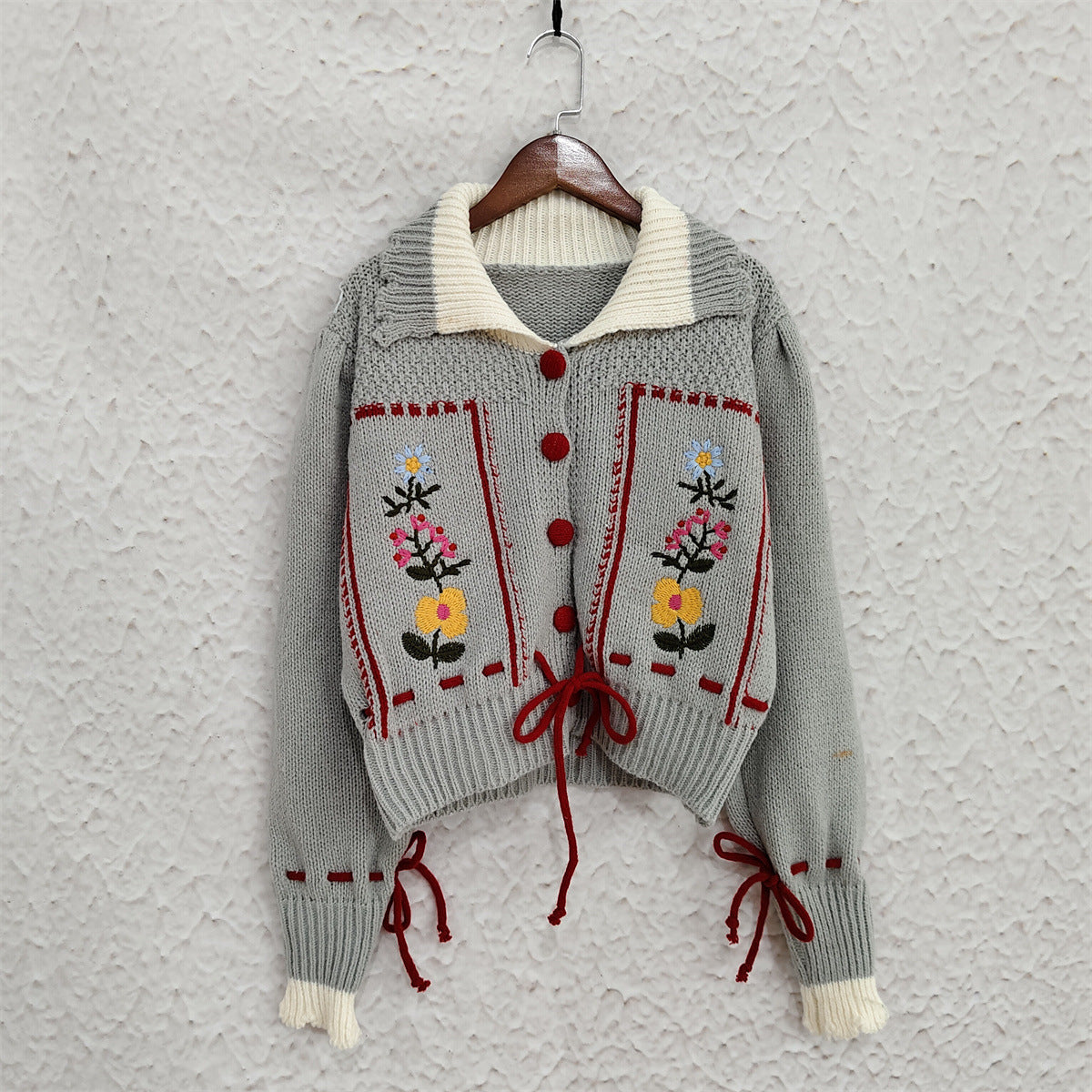 Damen Strickjacke Blumenstickerei Kordelzug Norvielle