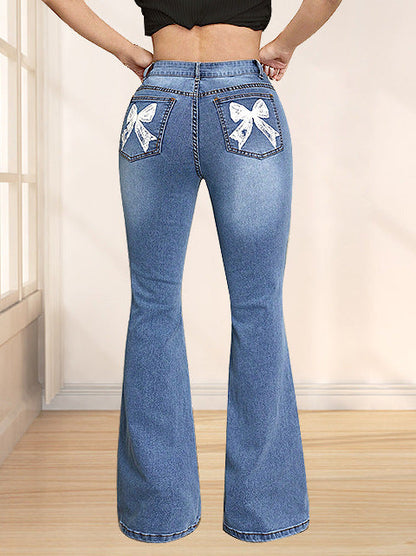 Damen Schlagjeans Dekorative Schleifen Norvielle