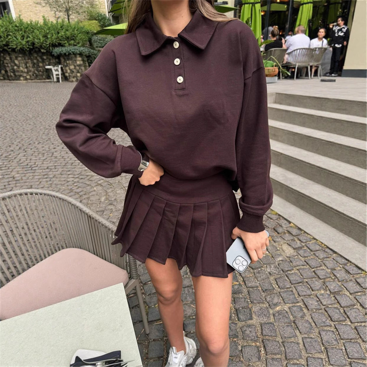 Damen Polo- mit Faltenrock und Knöpfen