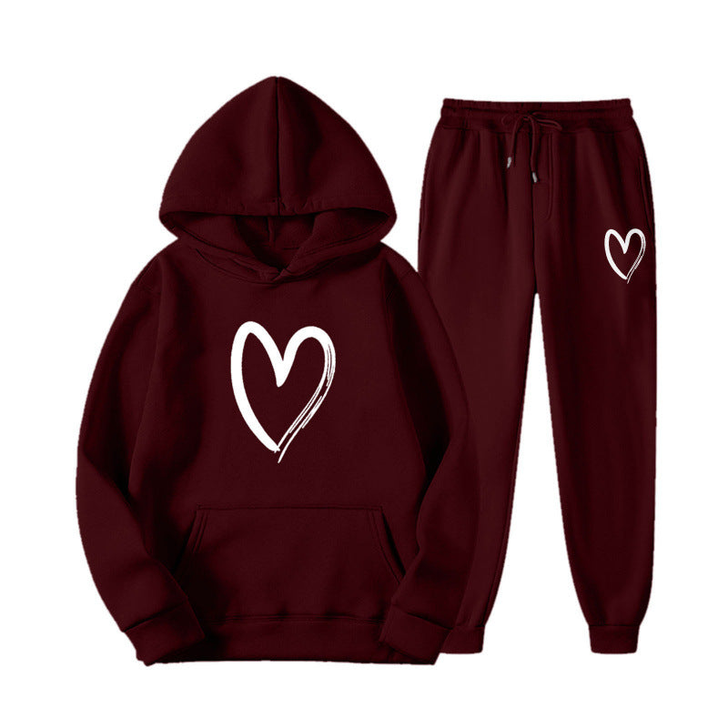 Damen Sweatanzug Kängurutasche Herzprint Grün