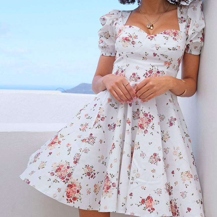 Damenkleid mit Puffärmeln Florales Design Norvielle