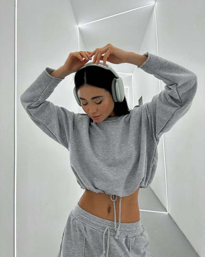 Damen Cropped Sweatshirt mit Kordelzug und weiten Ärmeln Grau