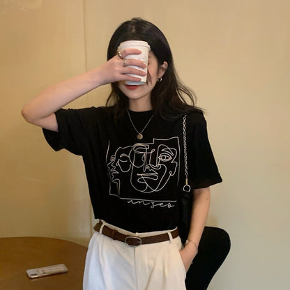 Damen T-Shirt mit Linienkunst-Motiv und lässiger Passform Schwarz - Norvielle