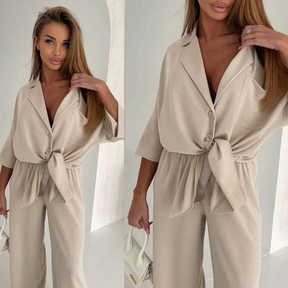 Damen Jumpsuit Bindegürtel Weite Beine Norvielle