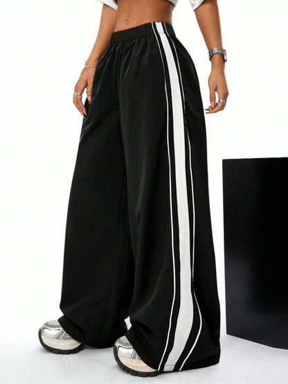 Damen Sporthose Weit mit Kontraststreifen