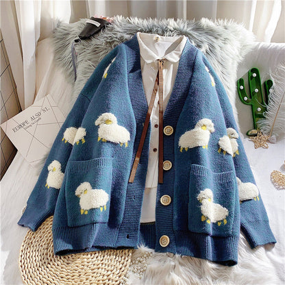 Damen Strickjacke Schafe-Motiv gemustert mit Taschen Norvielle