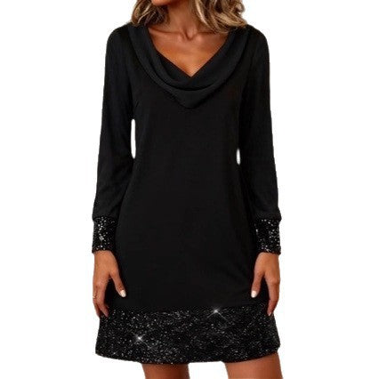 Damenkleid mit schimmerndem Saum und Rückenpartie Norvielle