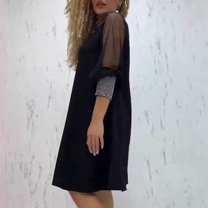Damen Abendkleid mit transparenten Ärmeln und Glitzerakzenten