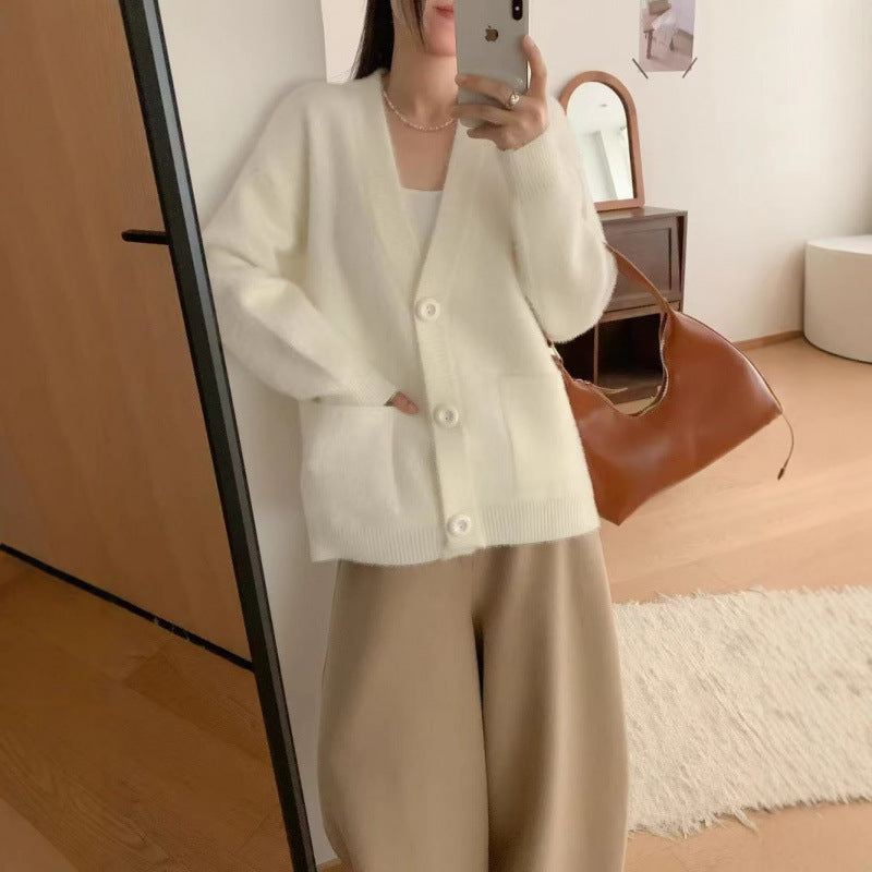 Damen Flauschiger Cardigan mit Knöpfen und Taschen Norvielle