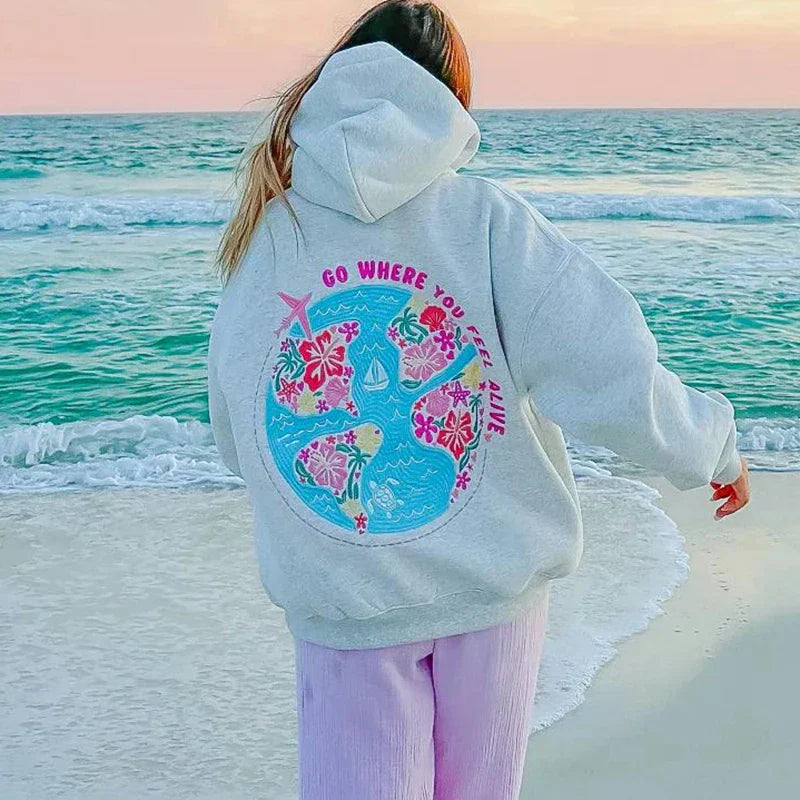Grauer Hoodie mit buntem Print und Reisezitat für Damen - Norvielle