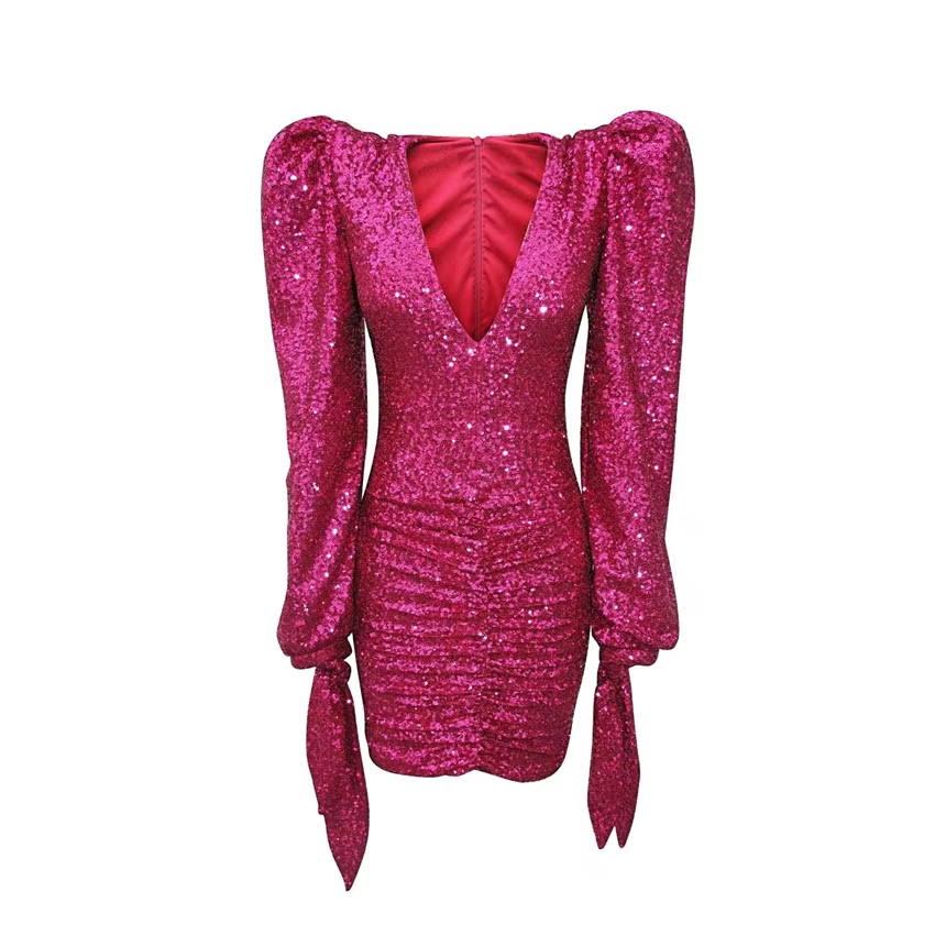 Detailaufnahme des Paillettenstoffs – funkelndes Finish in Fuchsia
