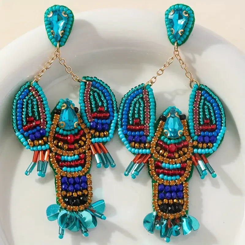 Türkise Lobster Statement-Ohrringe mit Perlen und Steinen
