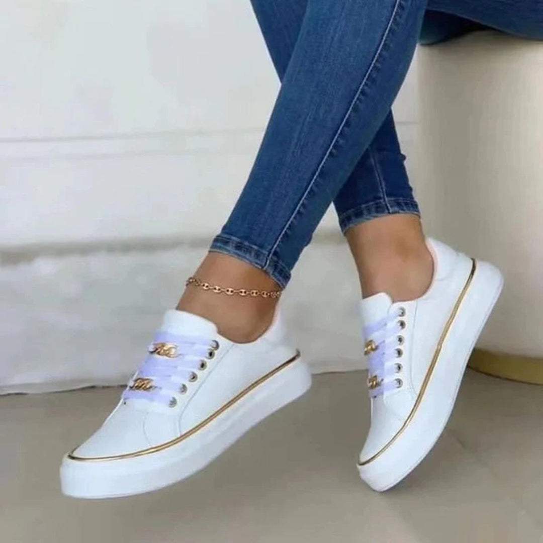 Damen Sneaker Weiß mit goldenen Akzenten und Schnürung